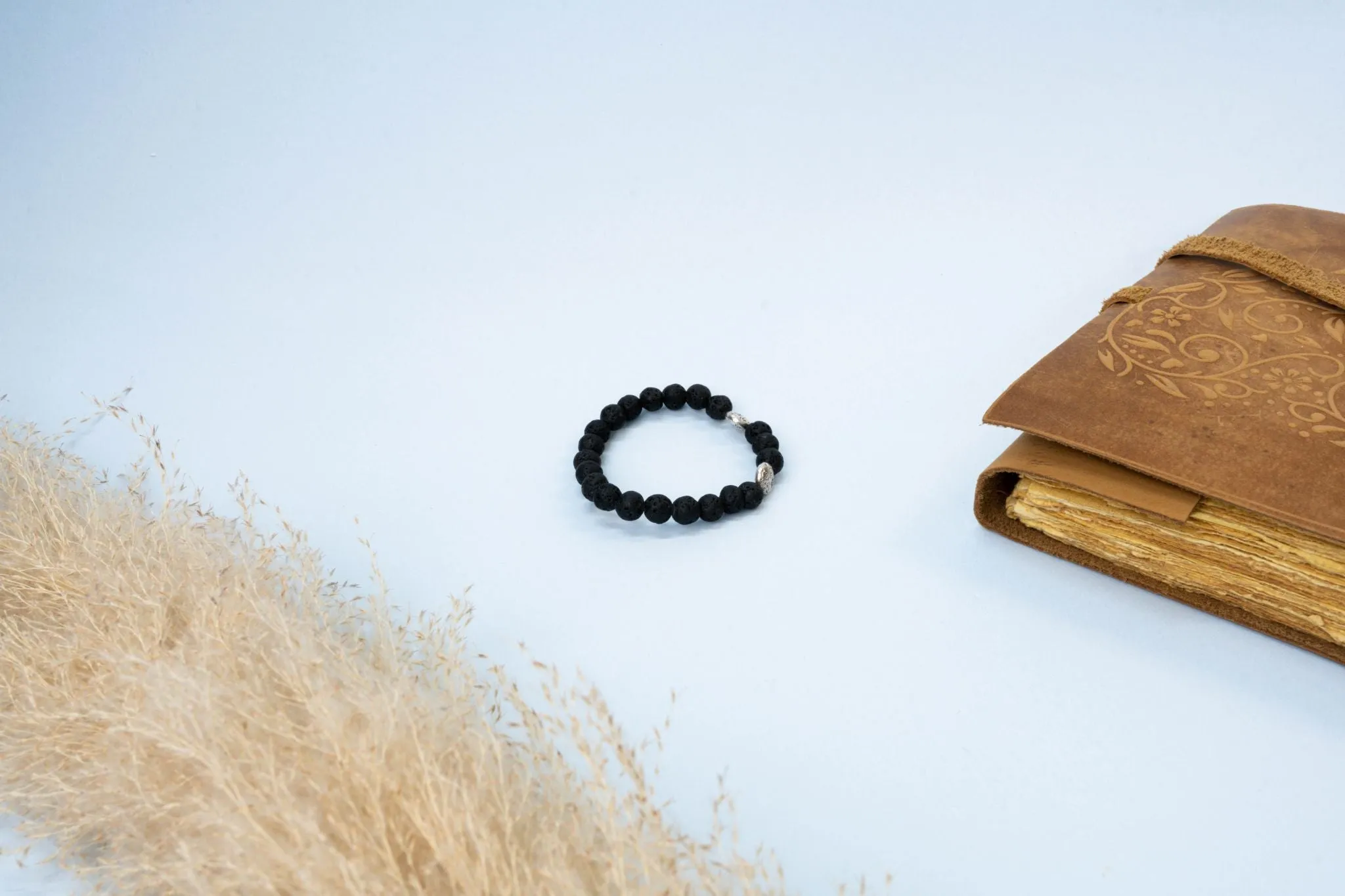 Lava Bracelet with Silver Charm
